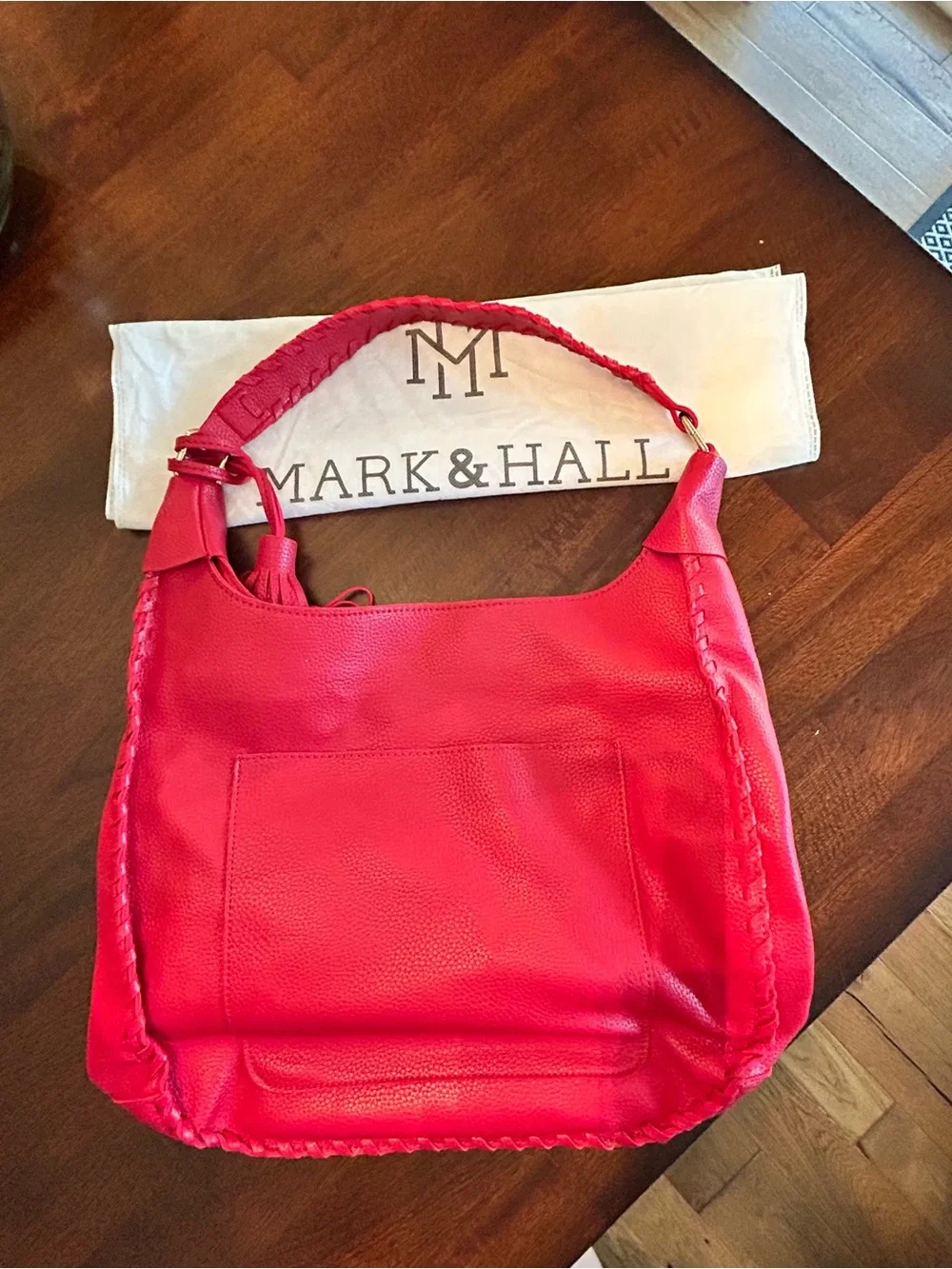 Mark & Hall shoulder Red pebbled Hobo Bag with Braided Trim and red tassel.
